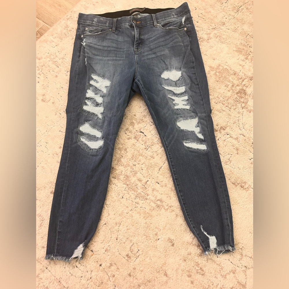 Torrid bombshell skinny distressed jeans with distressed ankle bottom-midrise